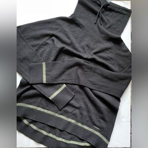 Sweaty Betty black wool sweater w. drawstring turtleneck and sage accent stripes